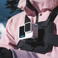 Girl using the GoPro Hero 13 in Polar White mounted on chest