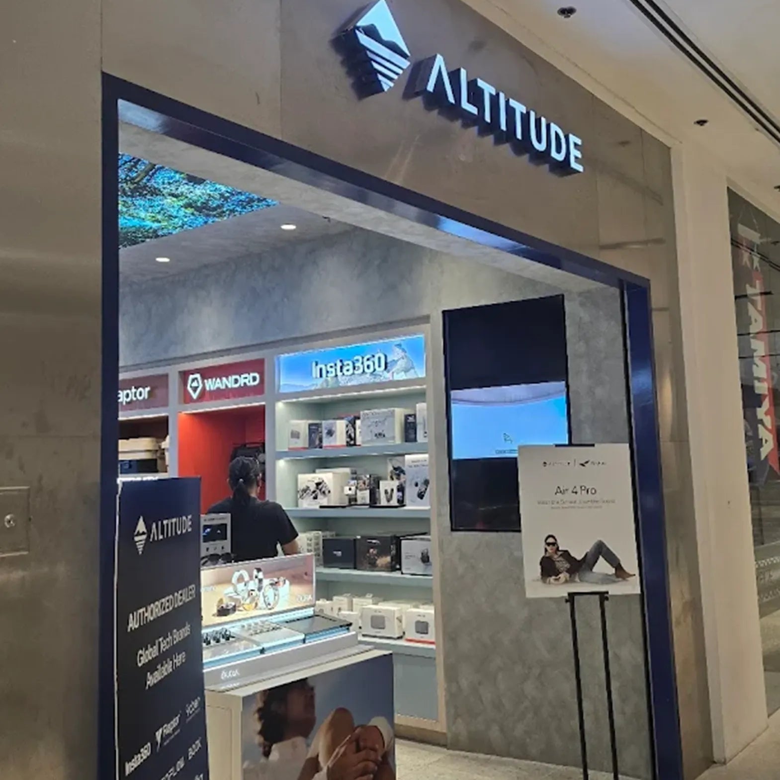 Multibrand store showcasing cameras and travel backpacks for creators | Altitude Philippines