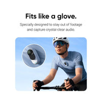Man cycling with the Insta360 Go 3S Action Camera with Mic wind muff mounted on his chest