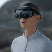 Person wearing the DJI Goggles 3 Outdoors