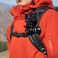 Insta360 Ace Pro 2 attached to backpack using the backpack clip
