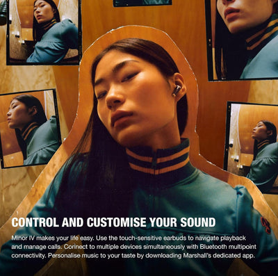 Woman listening to music using the Marshall Minor IV True Wireless Earbuds