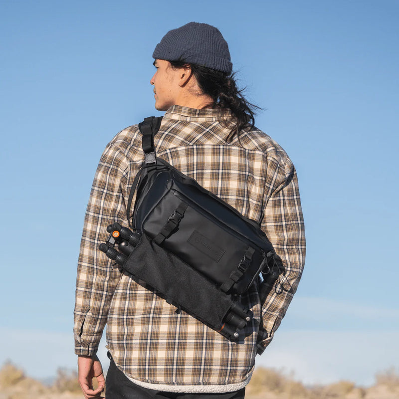 Guy using the Wandrd Rogue Sling 9L