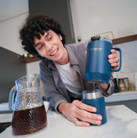 Raptor Drinkware Fusion 28 oz, 2-in-1 Double-Wall Vacuum Insulated Tumbler being used to drink iced tea