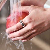 Hand washing a red apple under running water while wearing RingConn Gen 2 Smart Ring in Future SIlver