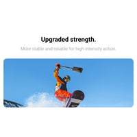 Guy snowboarding using the Insta360 Invisible Selfie Stick