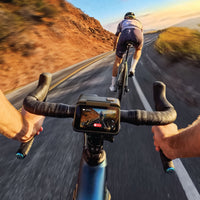 Insta360 Ace Pro Action Camera mounted on a bike handle bar