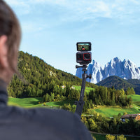 girl taking wide-angle selfie with the Insta360 Ace Action Camera