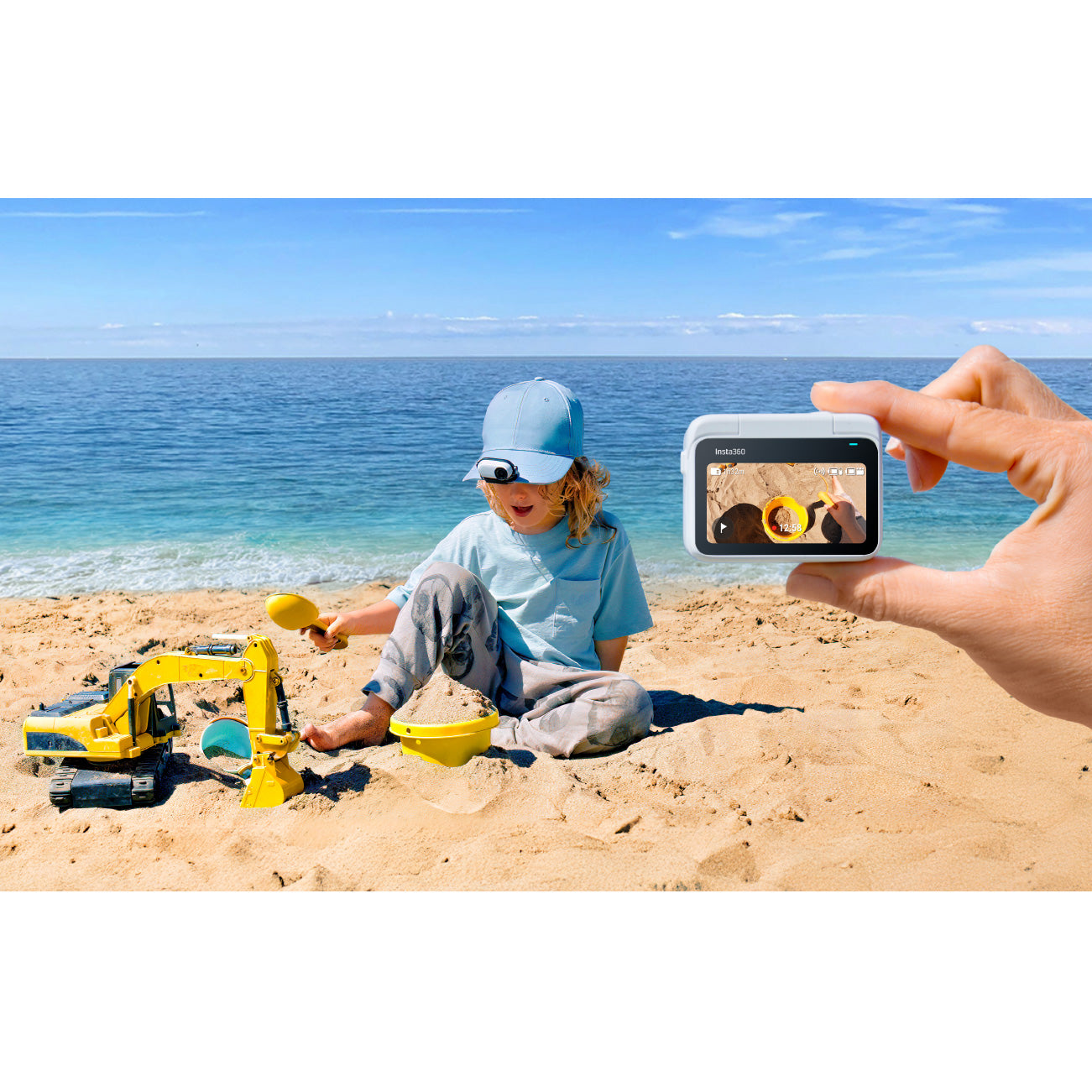 Kid using the Insta360 Go 3S Action Camera to record his POV playing in the sand
