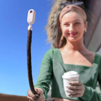 Girl taking videos using the Insta360 Monkey Tail Mount