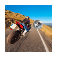 Guy road biking with the Insta360 Selfie Stick Support Clamp attached on motorcycle