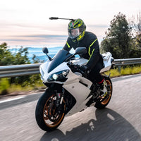 Guy on motorcycle using the Insta360 Unicorn Helmet Mount