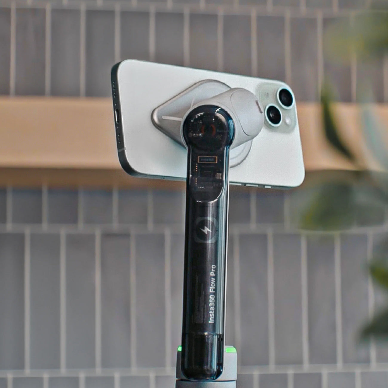 Insta360 Flow Magnetic Phone Mount attached to back of phone