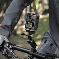 Cyclist using the DJI Osmo Action 3 mounted on the handlebar mount