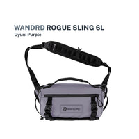 Rogue sling bag with black straps on a uyuni purple color