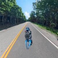 Guy on motorcycle using the Insta360 third-person backpack mount