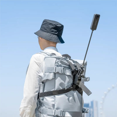Guy using the Insta360 third-person backpack mount on his bag